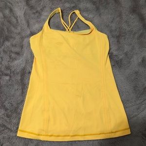 Bright yellow Lululemon workout top